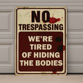 No Trespassing Sign – We’re Tired of Hiding the Bodies | Funny Warning Property Sign 19x13in
